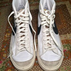 White and Black Nike blazers